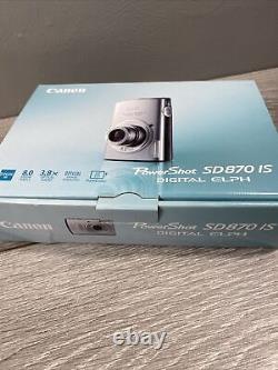 Canon PowerShot ELPH SD870 IS 8MP Digital Camera Silver WBattery & Charger Works